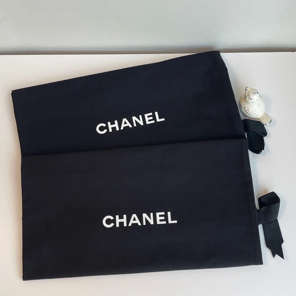 Pair Of Chanel Dust Bags
